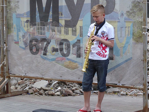 Kid playing trumpet in Vinnytsya