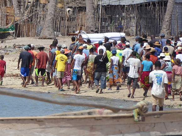 Funeral procession on the beach