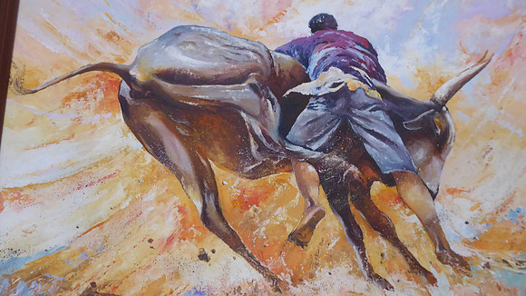 A depiction of a Malagasy tradition, bull wrestling