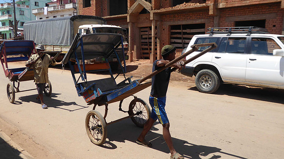 Hand drawn rickshaw, called a pouse pouse