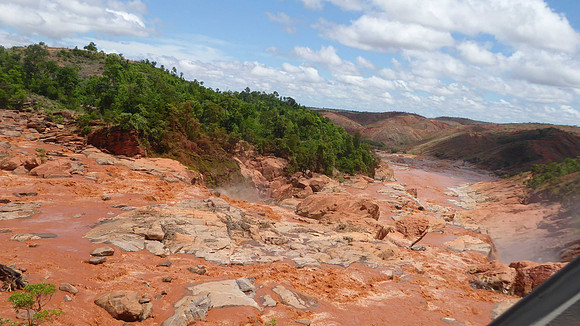 Rivers run red, the tropical rains strip the good earth from the barren hillsides.