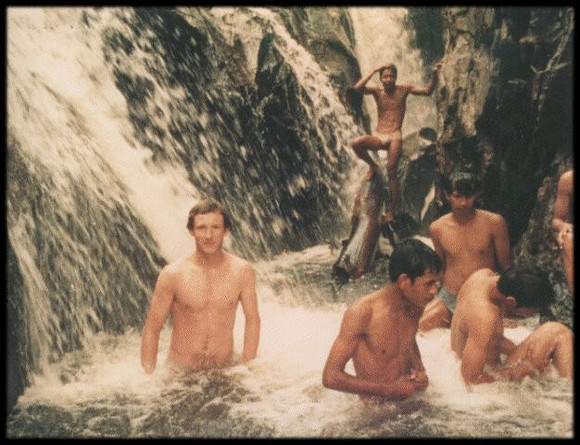 A refreshing dip in a jungle stream